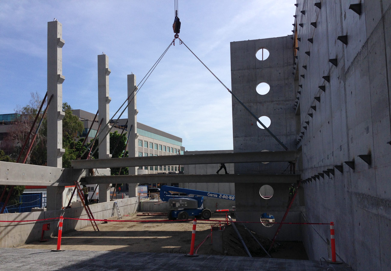 Precast concrete girders fabrication and installation for parkade and office building - Rapid-Span
